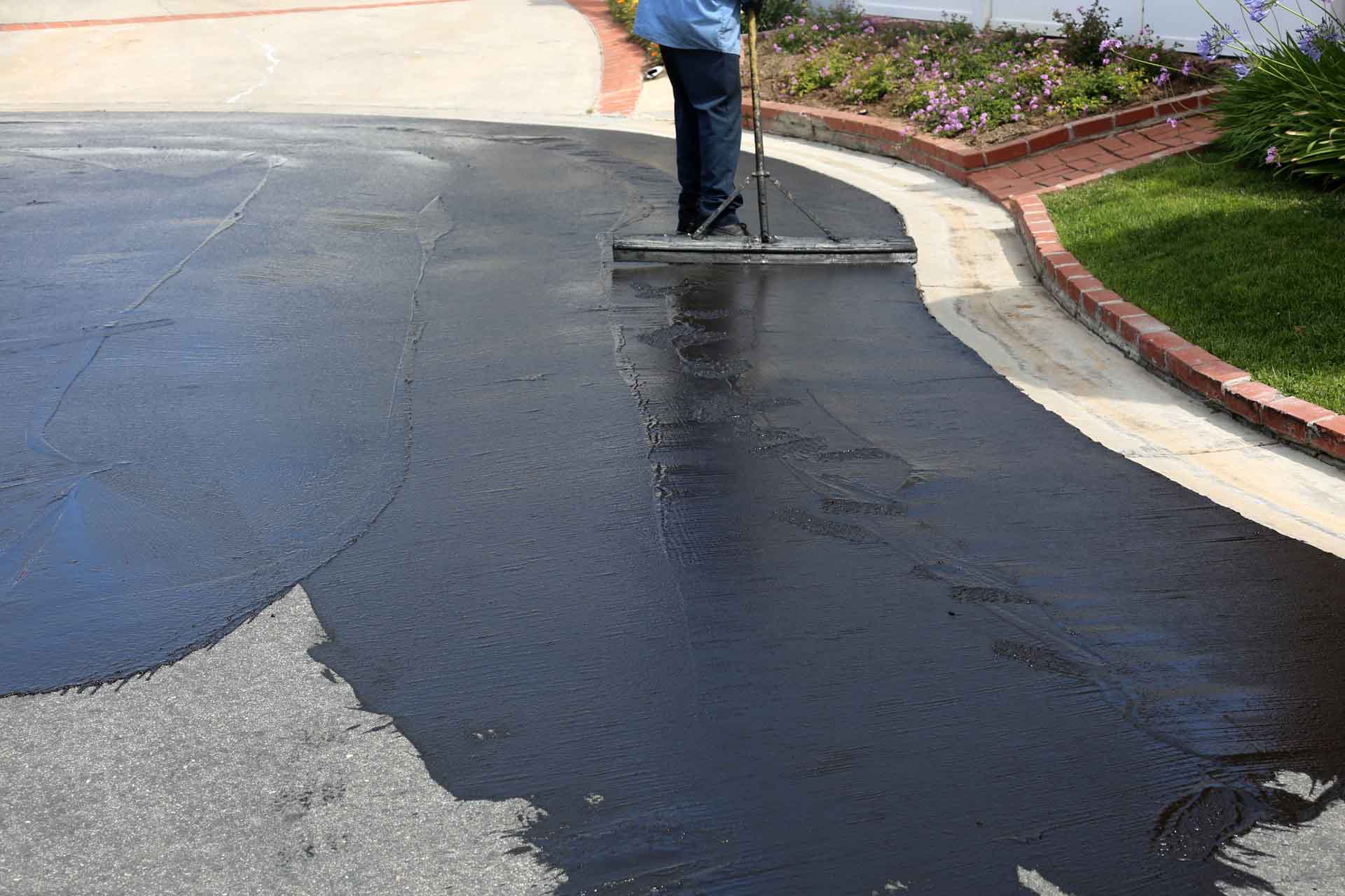 Asphalt driveway installation in Warrensburg, MO